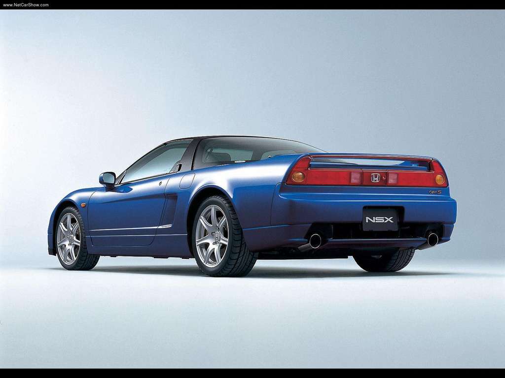 Honda-NSX_2002_1024x768_wallpaper_4e Blue Honda NSX shown from behind on a grey gradient background