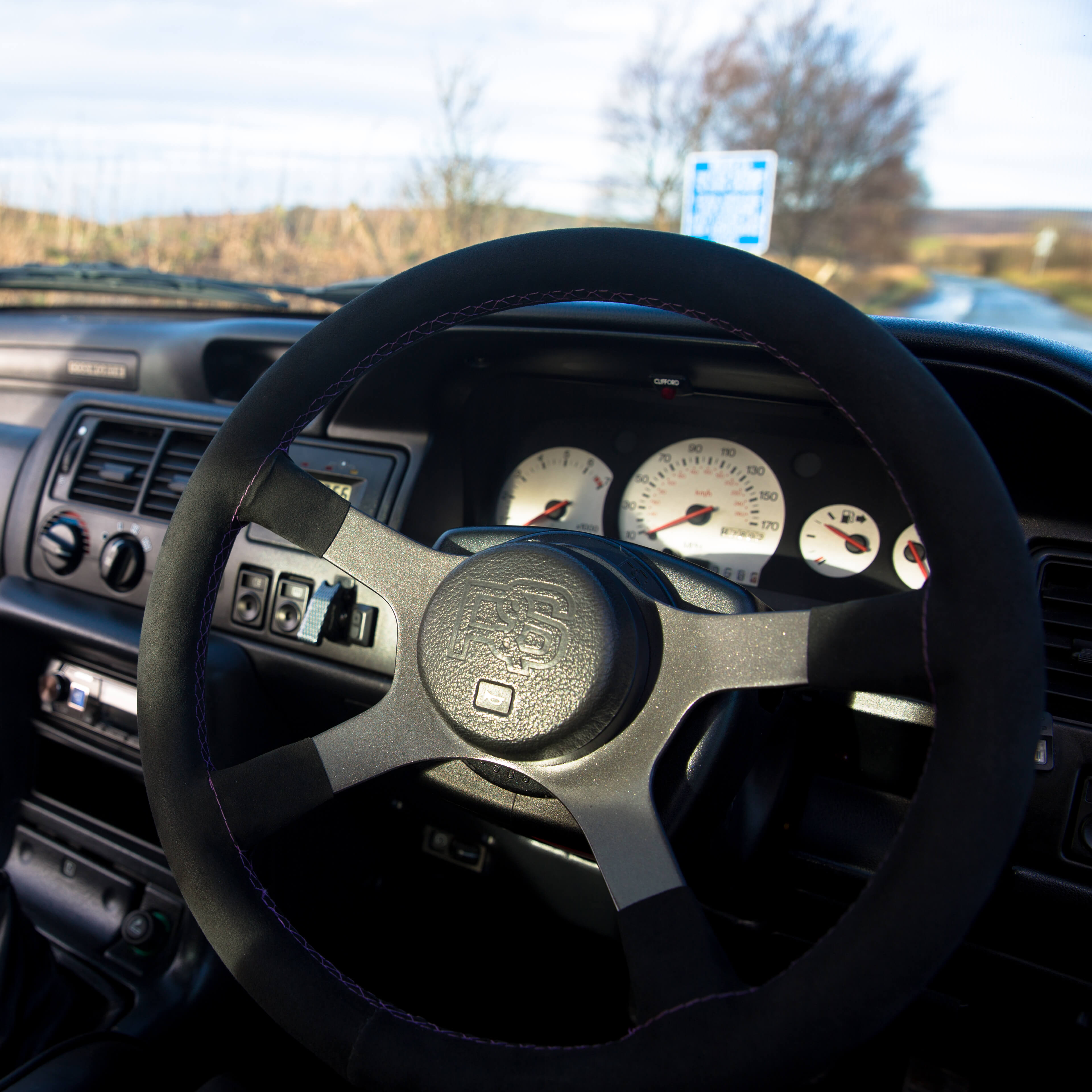 Escort RS Cosworth steering wheel and dashboard with view out of the front windscreen