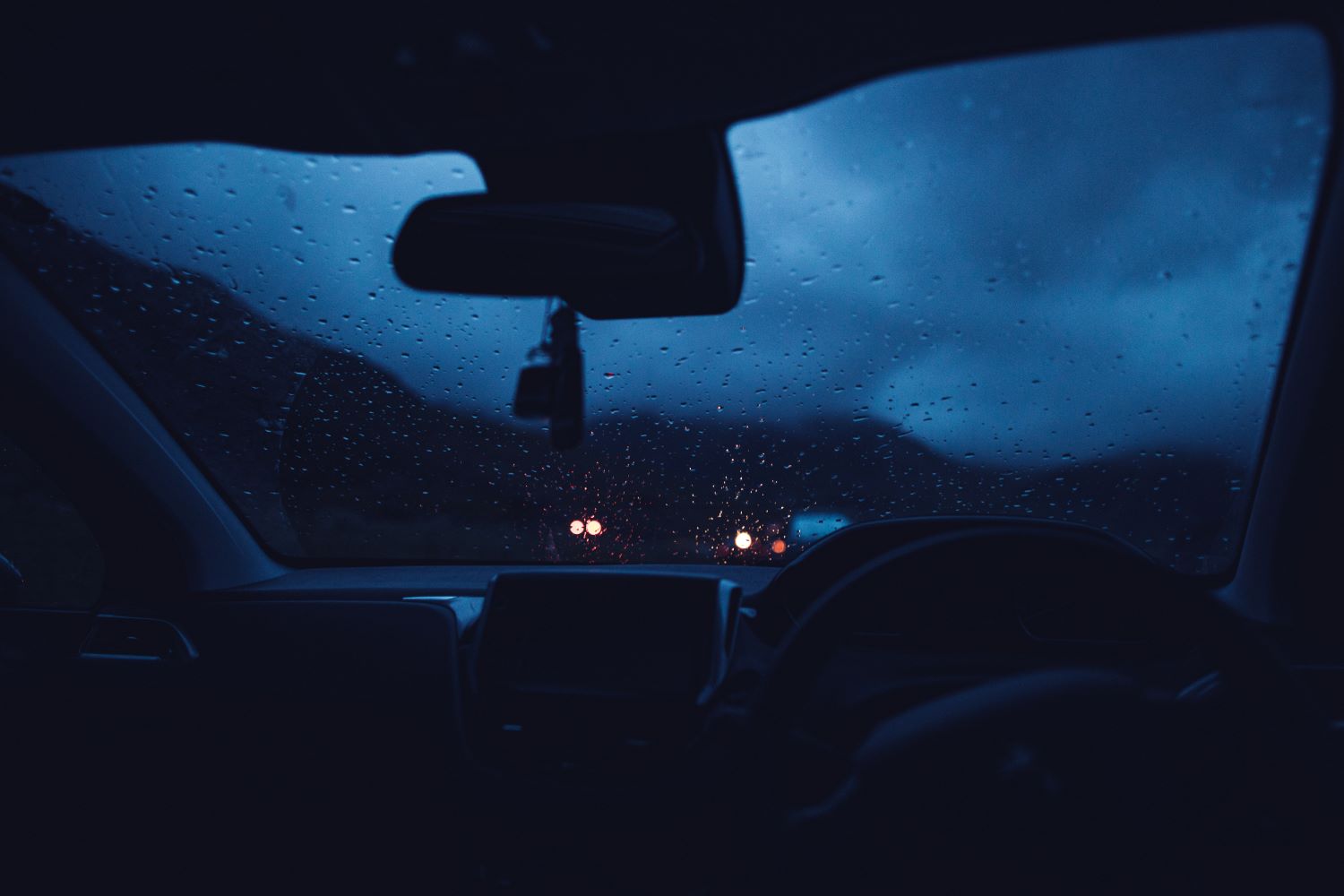 View from car windscreen on a dark rainy day