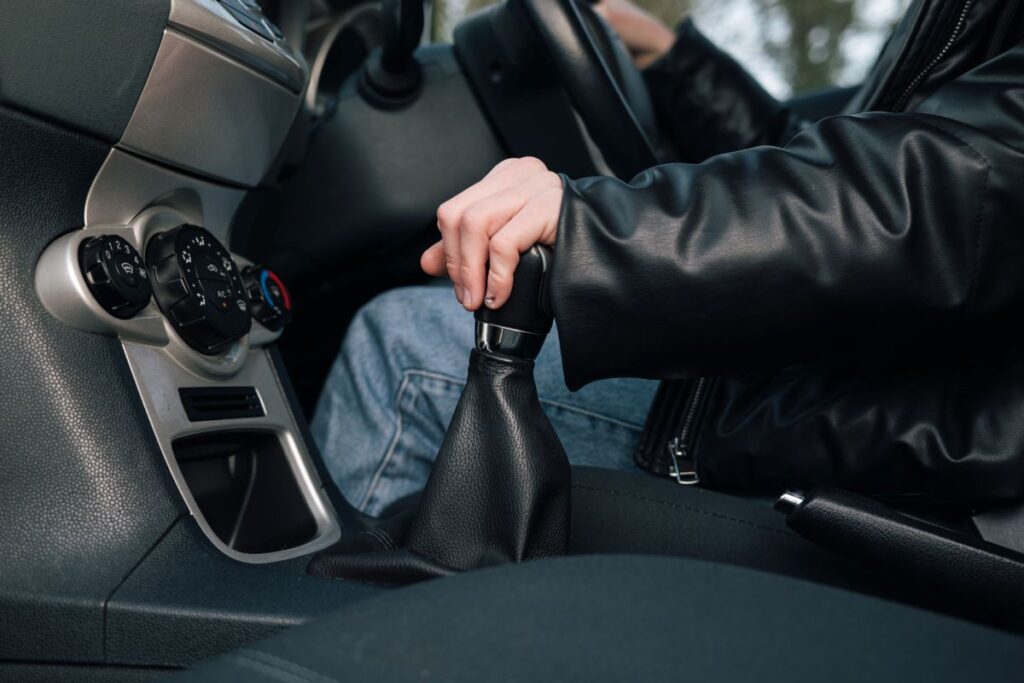 Person's hand on gearstick