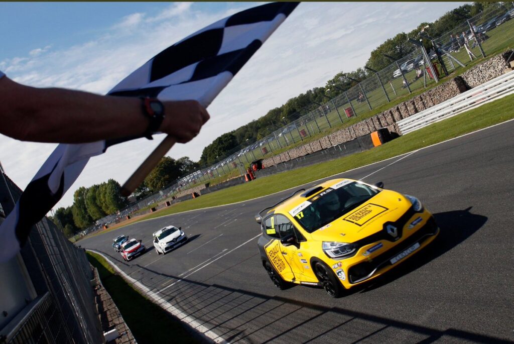 Max Marzorati crossing the line first in the Renault Clio Cup