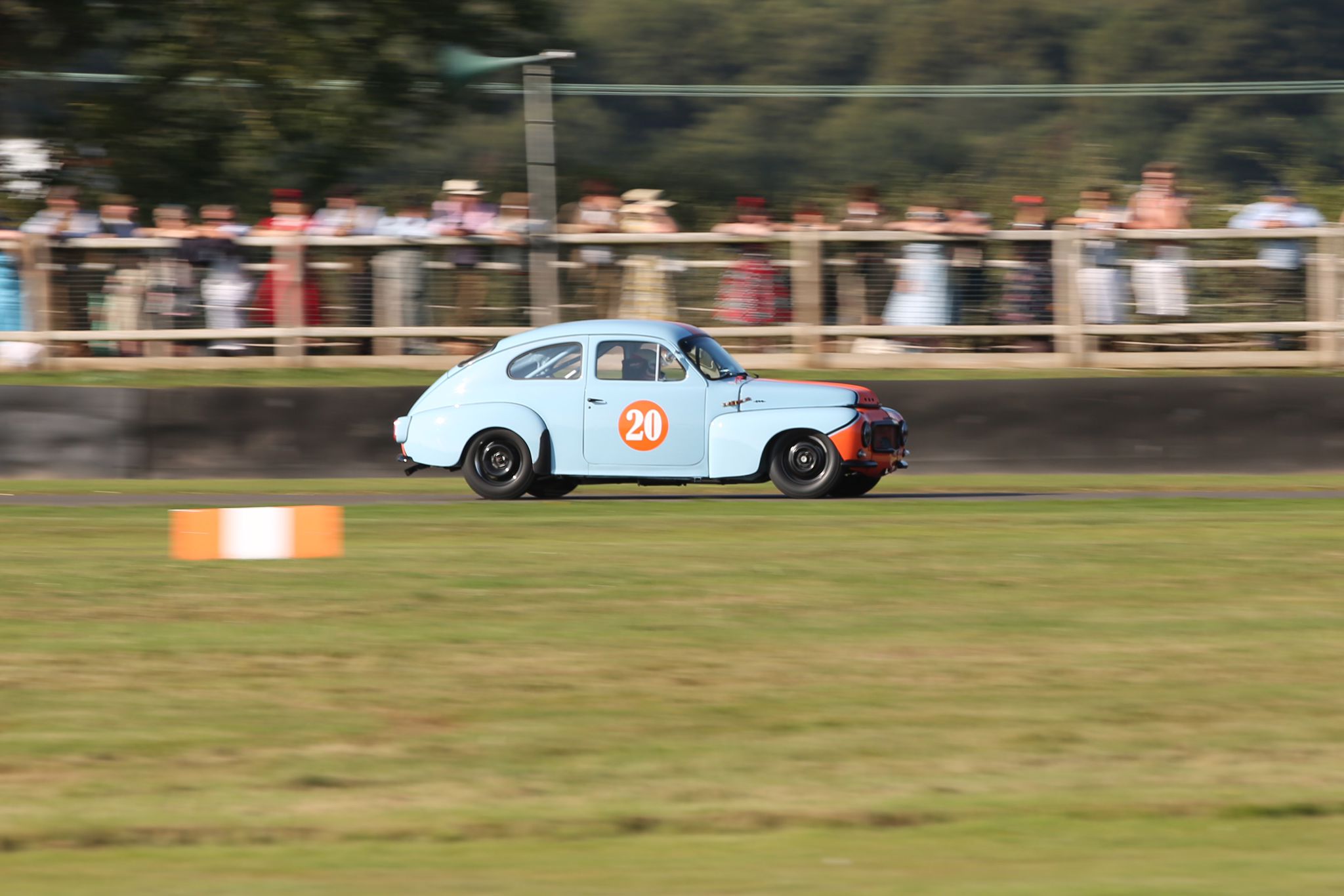 A Volvo PV544 flying around the track